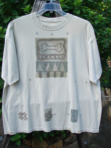1995 Short Sleeved Crop Tee Doggie Bone Beach Glass Size 1 features a bone and tree design, drop shoulders, and a ribbed neckline, showcasing vintage Blue Fish creativity in mid-weight cotton.