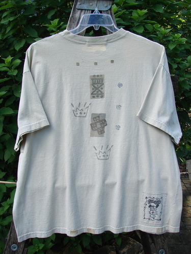 1995 Short Sleeved Crop Tee Doggie Bone Beach Glass Size 1 features a whimsical doggie bone design and a signature Blue Fish patch, showcasing a boxy shape and drop shoulders in mid-weight cotton.