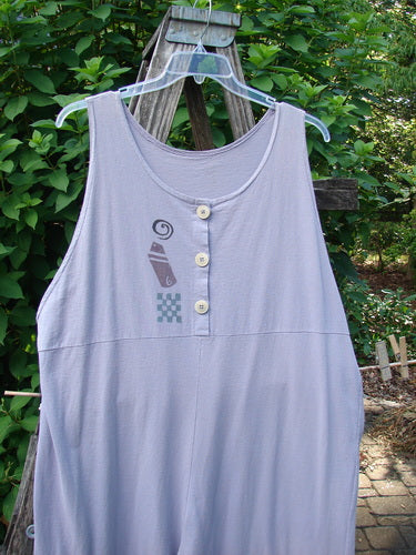 1993 Wide Pant Overall Jumper Travel Wind Periwinkle Size 2, displayed on a swinger, features wide, belled legs, original front buttons, and a gathered upper shoulder, epitomizing BlueFishFinder's vintage, expressive style.