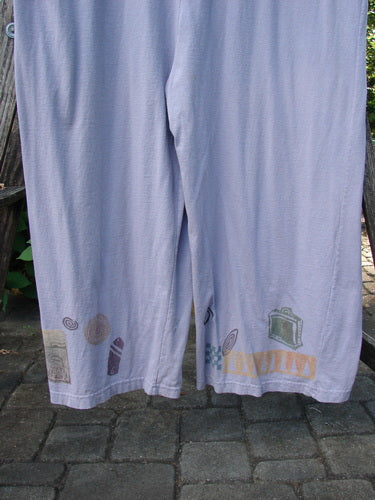 1993 Wide Pant Overall Jumper Travel Wind Periwinkle Size 2 features wide, swingy belled legs and unique front buttons. The empire waist and back-gathered yoke highlight its vintage-inspired design from Bluefishfinder.com.
