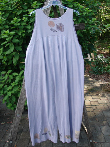 1993 Wide Pant Overall Jumper Travel Wind Periwinkle Size 2 features super wide belled legs, three unique front buttons, and a back-gathered shoulder, embodying vintage elegance and creative freedom.