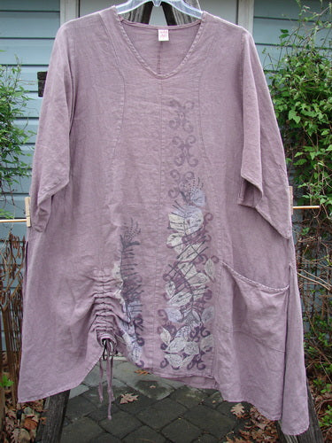 Barclay Linen High Vent Venetian Dress Celtic Fern Lavender Size 1, showcasing curved seams, softly dipped V neckline, A-line shape, and high side vents, with a Celtic fern design for a graceful drape.