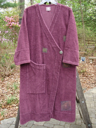 2000 Patched Chenille Side Wrap Robe Turn Time Murple Size 0 displayed on a wooden ladder, showcasing its unique wrap front, oversized pocket, and wide lower sleeves made from heavy cotton chenille.