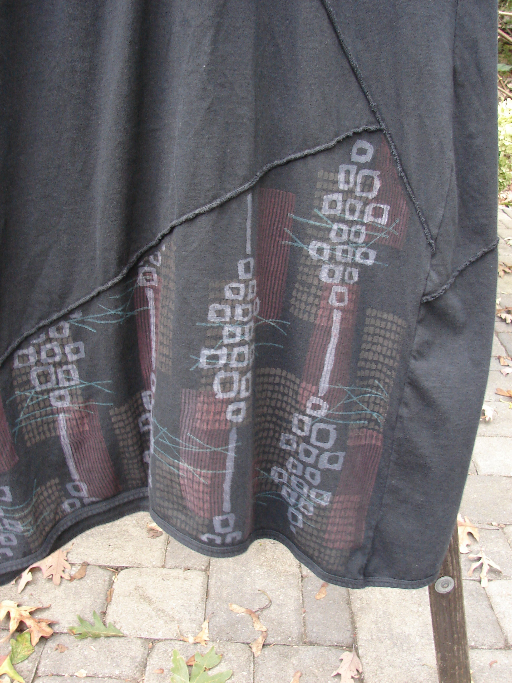 Barclay Diagonal Pocket Dress Stick Stone Black Size 0 features a wide A-line shape, V neckline, curly sleeves, and diagonal seams. The dress highlights its unique sticks and stones pattern.