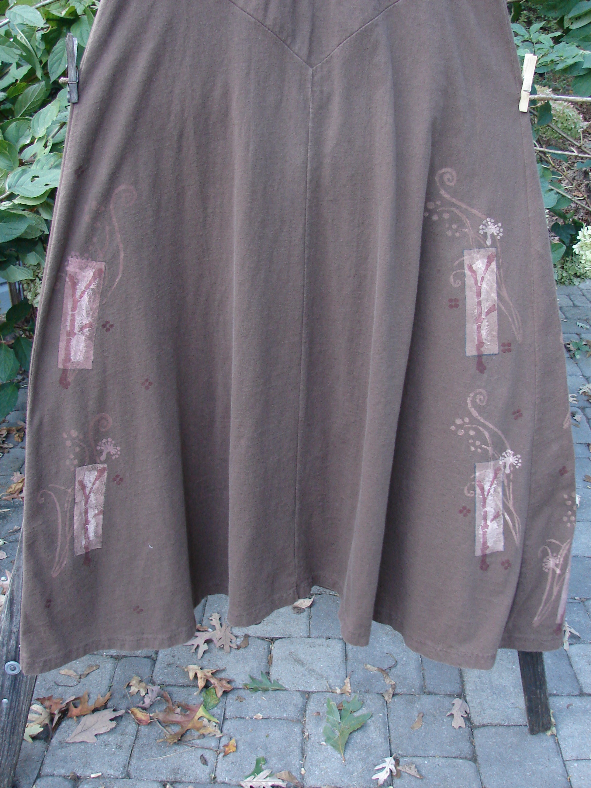 1997 Charmer's Jumper Magic Forest Mandorla Size 1 features a wide A-line flair, sleeveless design, keyhole front with shell button, and vertical center seams, showcasing the unique Magic Forest theme.