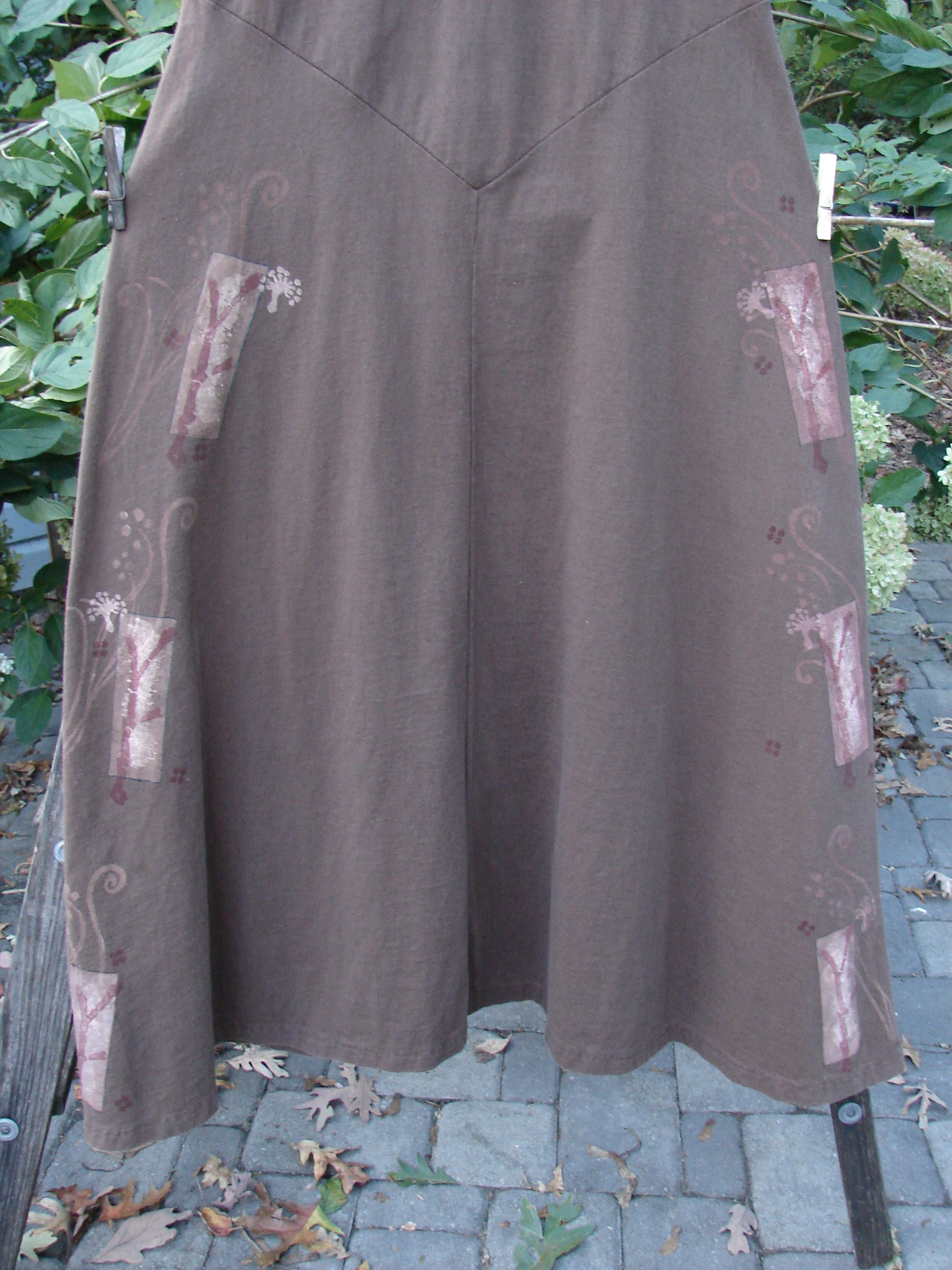 1997 Charmer's Jumper Magic Forest Mandorla Size 1 featuring a wide A-line flair, sleeveless jumper style, and a keyhole front with a shell button, showcasing the Magic Forest theme pattern.