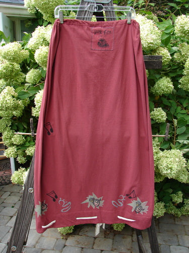 1992 Buttonloop Skirt Pomegranate Music OSFA, featuring a drawstring waist, bell shape, and musical note design with hand-dyed silk ribbon accents, from the Summer Collection of 1992.