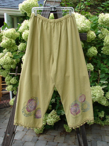 1999 Flannel PJ Pant with Pom Pom Rose Leaf design, size 2, hanging on a clothes line.