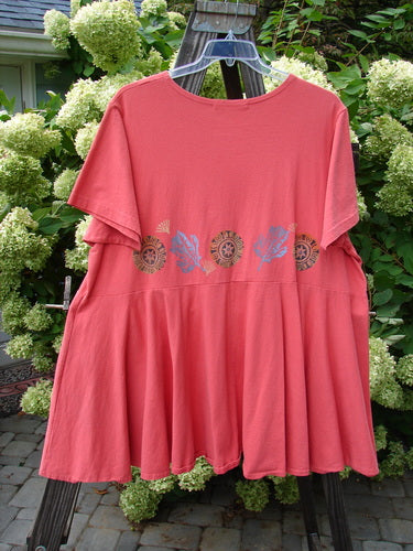 1997 Ocean Pearl Dress Star Coral Firefly Size 2 on a swinger, featuring a painted pocket, slight empire waist seam, and a rounded neckline, from Blue Fish's Summer Collection.