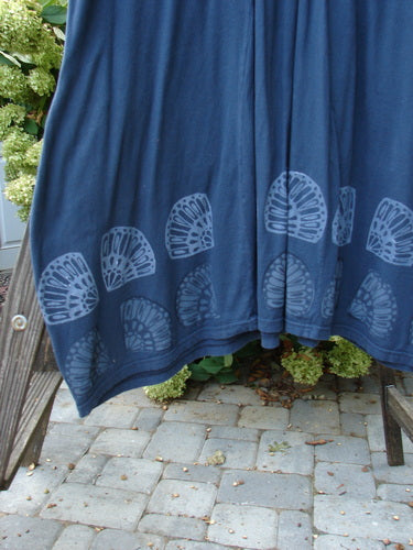 Barclay Farmer Jen Tunic Dress Shell Flower Navy Size 2, featuring intricate white floral designs, rear elastic tab, oversized front pockets, and a rounded neckline, made from organic cotton.