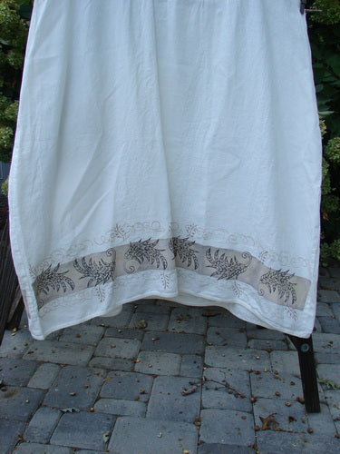 Barclay Linen Cotton Sleeve Banded Hem Pleat Dress Curl Fern White Size 2 displayed on a rack, featuring a rounded neckline, pleated design, and three-quarter sleeves.