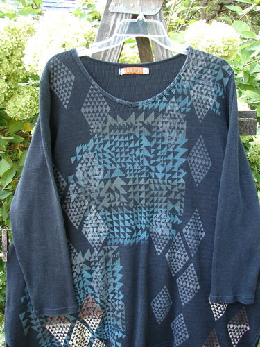 Barclay Thermal Shirttail Top Continuous Mosaic Black Size 1 featuring a patterned design, A-lined shape, shirttail rear hemline, long sleeves, and vented sides, as part of Bluefishfinder.com's vintage collection.