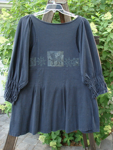 1993 Juliet Dress Vintage Structural Black Size 1: A romantic peasant dress with a wider V-shaped neckline, empire waist seam, and smocking in the lower sleeves. Features a crescent moon flaw and Blue Fish patch.
