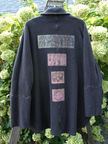 Barclay Patched Celtic Moss Deco Coat Farmhouse Brum OSFA features a thick cotton fleece, oversized vintage button, deep V neckline, and farmhouse patches, designed for a flowing, comfortable fit.