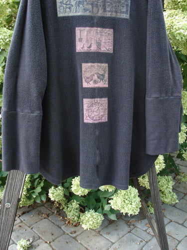 Barclay Patched Celtic Moss Deco Coat Farmhouse Brum OSFA: A thick cotton fleece coat with a deep V neckline, oversized vintage button, drop Dolman shoulders, foldable sleeves, and a single front flop pocket.