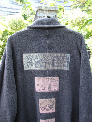 Barclay Patched Celtic Moss Deco Coat Farmhouse Brum OSFA: A thick cotton fleece coat with oversized vintage buttons, deep V neckline, drop dolman shoulders, foldable sleeves, and a large front pocket.