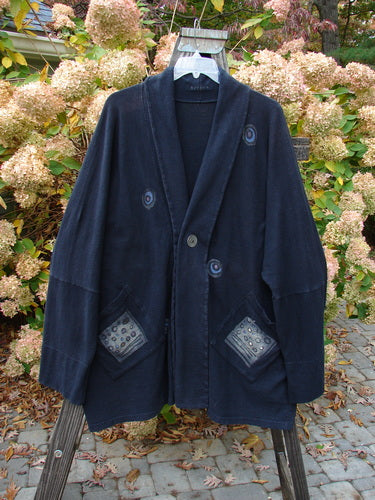 1995 Reprocessed Deco Jacket Polka Gal Black OSFA featuring oversized painted pockets, double button hole, and drop dolman shoulders, embodying vintage Blue Fish Clothing's creative and individualistic style.