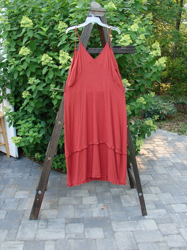 2000 Wool Pointelle Lulu Slip Dress Sienna Unpainted Tiny Size 2 displayed on a wooden ladder showcasing super thin shoulder straps, criss-cross upper bodice, and sectional layers of horizontal lower lettuce edging.