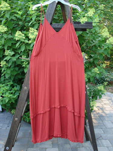 2000 Wool Pointelle Lulu Slip Dress Sienna Unpainted Tiny Size 2: A red dress on a wooden rack, close-up of the dress, and a red dress from a ladder.