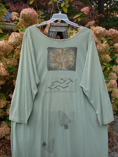 1995 Farmer Jen Dress Fall Leaves Dinette Green Size 2 with long sleeves, a wider neckline, center lower pleats, and multiple pockets, including stacked upper and deep front cargo pockets.