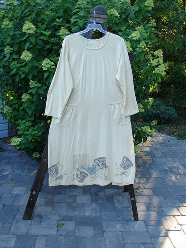 1999 Tea Time Dress Fancy Pot Buttercup Size 2, displayed on a rack, showcasing its hourglass shape, front elastic-topped pockets, and detailed flower pot theme.