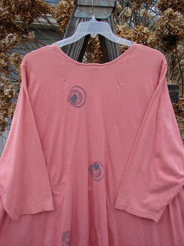 1994 Treasure Jacket Wind Spin Altered Coral OSFA: Pink shirt with circles, drop shoulder seams, front flop pockets, and V neckline.