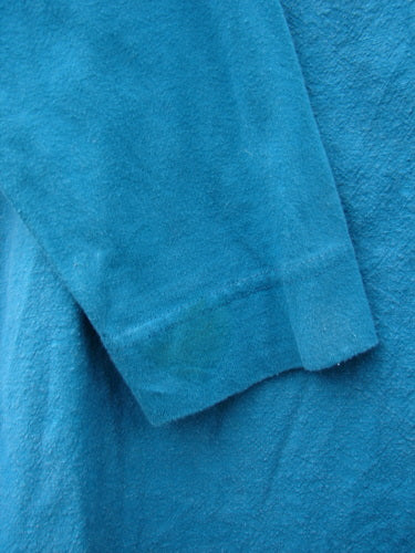 Close-up of the Barclay Cotton Sleeve Hemp Jacket in Aqua, showcasing the detailed stitchwork and mid-weight organic hemp cotton fabric.