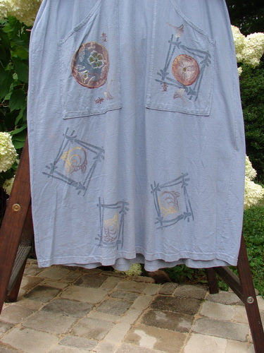 1999 Sukura Dress Asian Fan Bluestone Size 2, showcasing a front three-button design, optional accent belt, large off-set pockets, and a gathered rear skirt, embodying Blue Fish's creative vintage style.