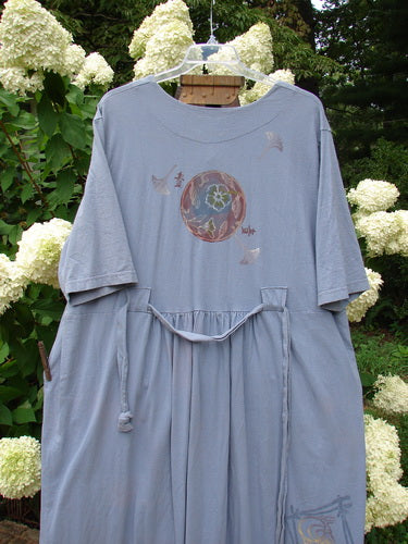 1999 Sukura Dress Asian Fan Bluestone Size 2 with front pinhole, three-button front, optional belt, large offset pockets, gathered rear skirt, Blue Fish patch, and fall-themed paint details.