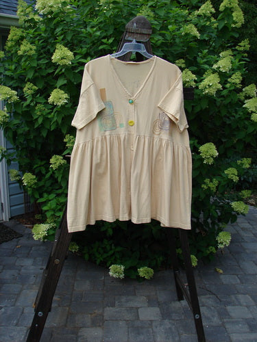 1995 Tree Top Dress Flower Double Vase Glint OSFA displayed on a hanger, showing its V-shaped neckline, unique floral and double vase design, vintage buttons, and gathered super full lower empire waistline.