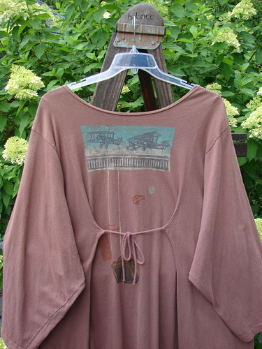 1993 Blueline Jacket Antique Aircraft Dried Rose Size 2 displayed on a mannequin, showcasing its A-line shape, detailed travel-themed print, and unique curved panels with drawcord ties.