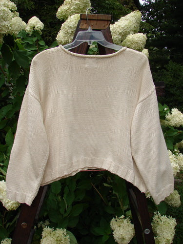 1999 Limited Edition Patched Boxy Pullover Sweater Window Chair Tea Dye OSFA displayed on a plastic mannequin, featuring a square boxy shape, ribbed knittery, and a giant patched front design.