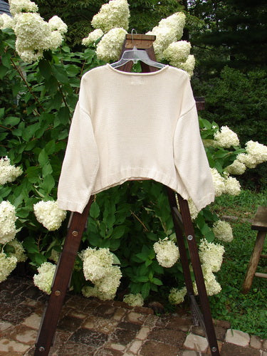 1999 Limited Edition Patched Boxy Pullover Sweater Chair Window OSFA: A white sweater with a giant patched front painted in a chair and window theme, featuring a square boxy shape, ribbed knittery, and a softly rolled neckline.