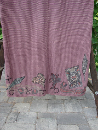 1993 Waffle Pocket Sweater Jumper Heart Feather Dusty Plum Size 2 on a hanger, showcasing its thick thermal waffle weave, oversized painted front pocket with vintage button, and distinctive heart feather design.