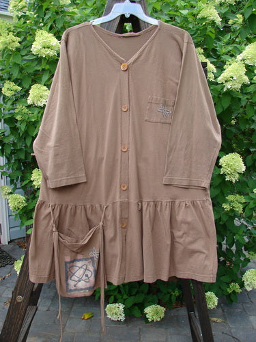 1995 Clothespin Jacket Space Travel Mudpie OSFA displayed on a hanger, featuring a flared lower flounce, a single offset pocket with blue buttons, and a space travel-themed paint design.