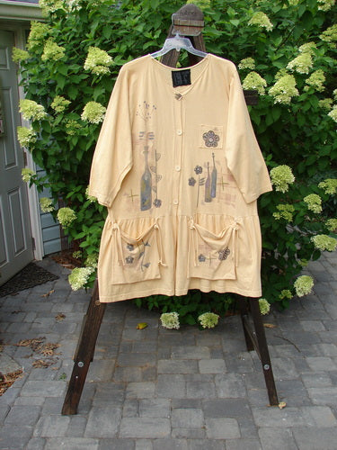 1995 Clothespin Jacket Celebrate Glint OSFA, featuring a flared lower flounce, festive paint, original Blue Fish buttons, and uniquely painted tie-on pockets, displayed on a rack.