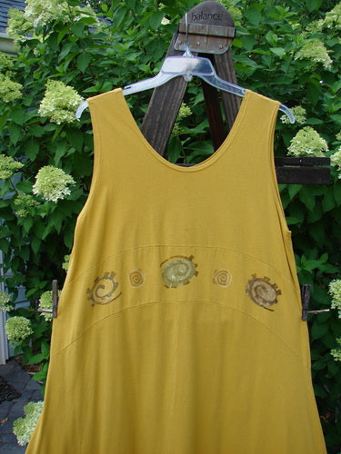 1995 Zelda Jumper Dress Abstract Key Lemon Size 2: A yellow dress with a sweeping A-line shape and abstract pattern. Perfect for a versatile and stylish look.