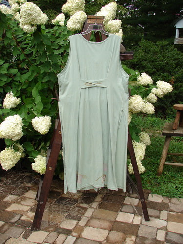 1995 Arbor Vest Kitchen Mixer Dinette Green OSFA displayed on a rack, featuring a deep V-neckline, rounded hemline, and front painted breast pocket with original Blue Fish recycled paper buttons.