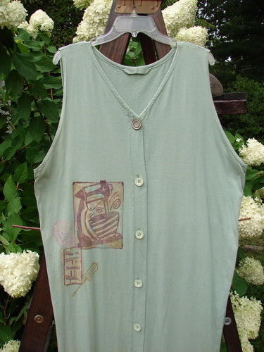 1995 Arbor Vest Kitchen Mixer Dinette Green OSFA features a painted front breast pocket, deep V neckline, original buttons, and unique back drop gathers. Made from organic cotton, perfect for vintage fashion enthusiasts.