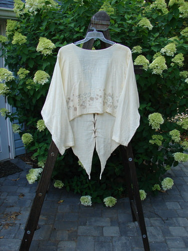 1997 Gauze Pickle Jacket Garden Path Kauiclla Size 2: A white shirt on a rack with a pattern on it, from the Exclusive Summer Gauze Collection.