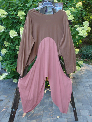 Barclay Calligrapher's Jacket Unpainted Mauve Brown Size 2 displayed on a rack, showcasing its unique shape with long dippy sides, open hips, and a deep V-shaped neckline.