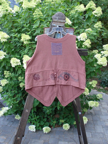 1995 Reprocessed Drawing Room Vest Windy Planet Clove OSFA on a rack, showcasing its ceramic button front, tailored drawcord back, front pocket, and signature patch.
