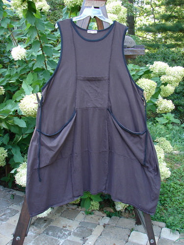 Barclay Cotton Lycra Contrast Pocket Jumper with double front pockets and rounded neckline displayed on a wooden post, showcasing its easy-flowing fabric and generous measurements.