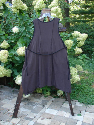 Barclay Cotton Lycra Contrast Pocket Jumper Unpainted Plum Royal Size 2, displayed on a clothes rack, showcasing its rounded neckline, deeper arm openings, and double front flop drop pockets.