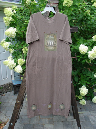 1999 Straight Dress Nesting Bowls Riverbed Size 1 displayed on a mannequin, featuring two rounded side pockets, a paneled neckline, widening hips, a narrowing vented hemline, and stacked nesting bowls theme paint.