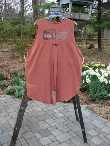 1995 Breeze Vest Space Odyssey Russet OSFA: A red shirt on a rack, featuring a deep V-shaped neckline, rounded vented sides, and a front painted breast pocket.