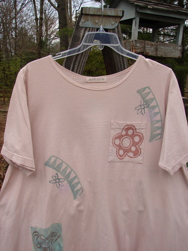 1995 New Look Dress Dot Flower Vase China OSFA featuring a pink shirt with a flower design, front upper breast pocket, drawcord back, and sweeping A-line shape from the Spring Collection.