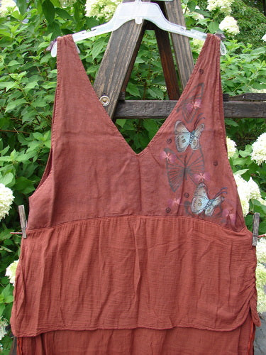 Barclay Gauze Linen Two Tier Ribbon Jumper Butterflies Cinnabar Size 1 with deep V neckline, butterfly patterns, silk ribbon ties, and lace-up front, highlighting its unique layered design and gathered sides.