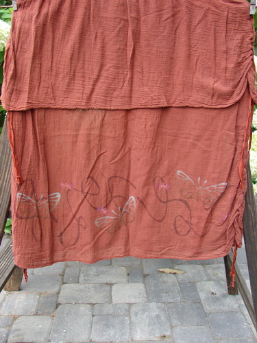 Barclay Gauze Linen Two Tier Ribbon Jumper Butterflies Cinnabar Size 1 features butterfly motifs, variegated silk ribbon ties, and a deep V-neckline with a unique empire waist seam.
