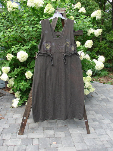 1994 Scroll Jumper Wind Edo Black OSFA displayed on a wooden stand, showcasing its double-paneled upper bodice, dramatic V-shaped neckline, and empire waist seam with dual loops for cords.